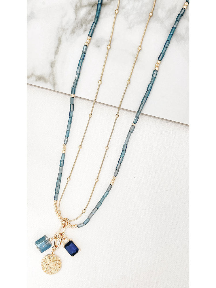 Envy Long Gold and Blue Double Layer Necklace with Coin and Charm Pendants